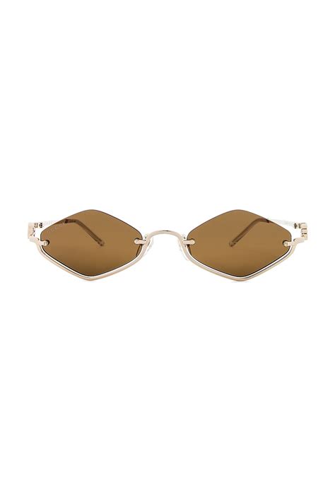 Gucci Gg Upside Down Geometrical Sunglasses in Gold